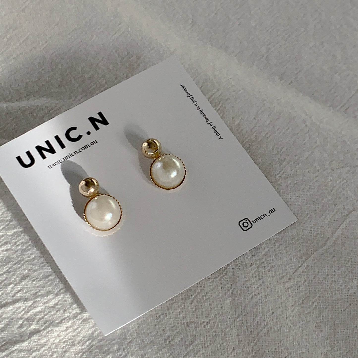 Gold Rim Pearl Drop Earrings